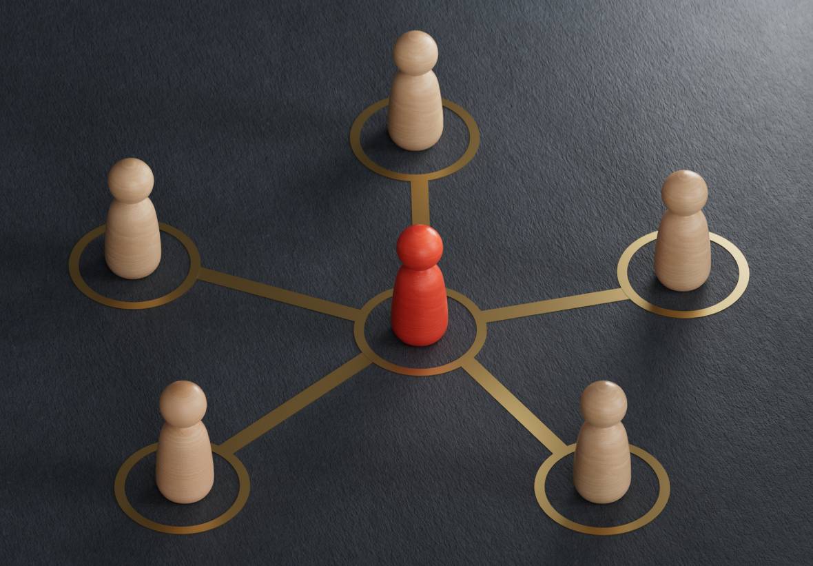 Central red figure connected to others