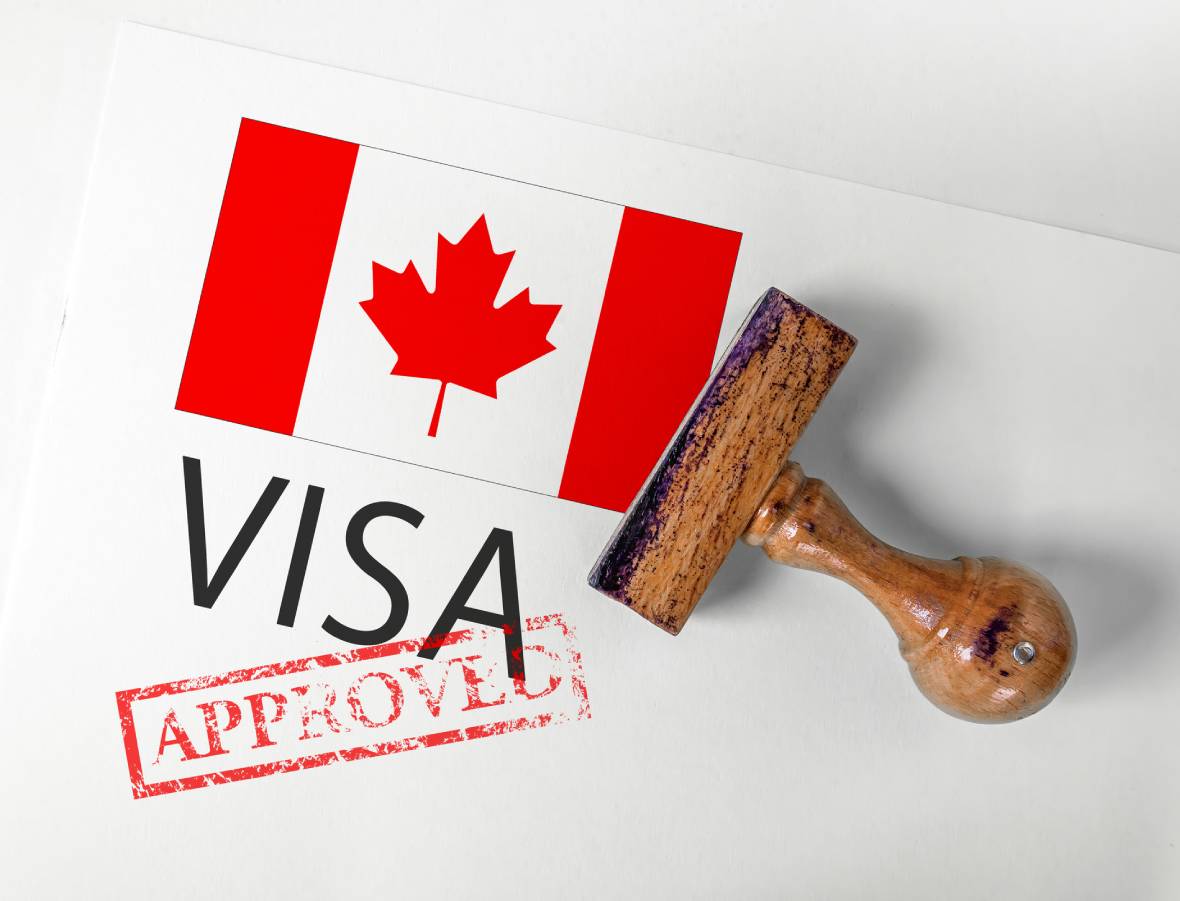 Approved stamp on Canadian visa document