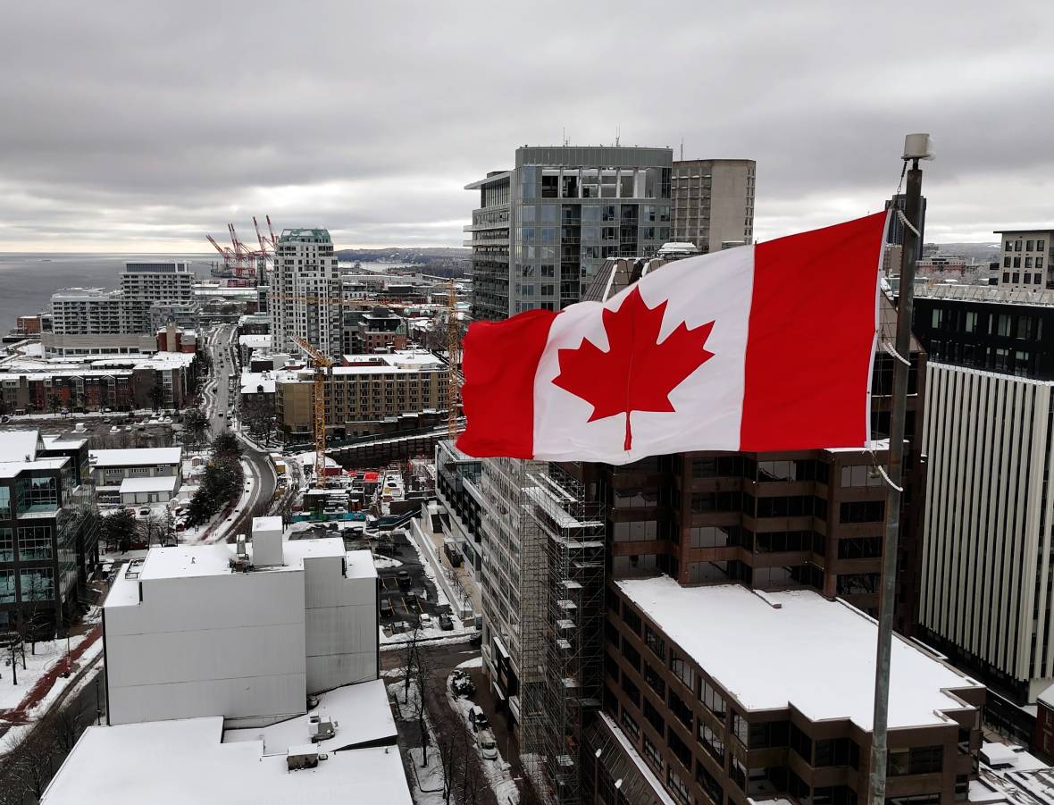 Urban skyline with Canadian flag