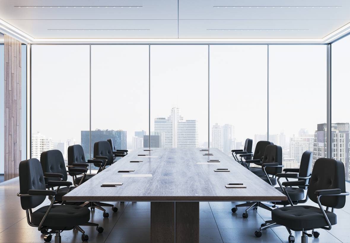 Large meeting table with chairs